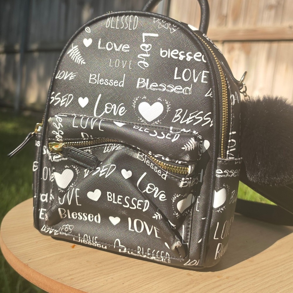 Love Blessed Mini Backpack Black Faux Leather Pom Pom Charm Gold Hardware